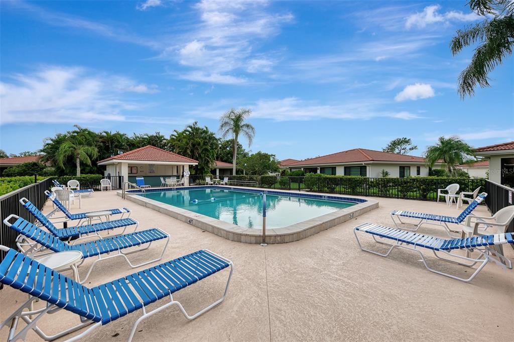 5103 Greencroft Road Sarasota, FL 34235 - Photo 13 of 25 a view of a patio with swimming pool and furniture