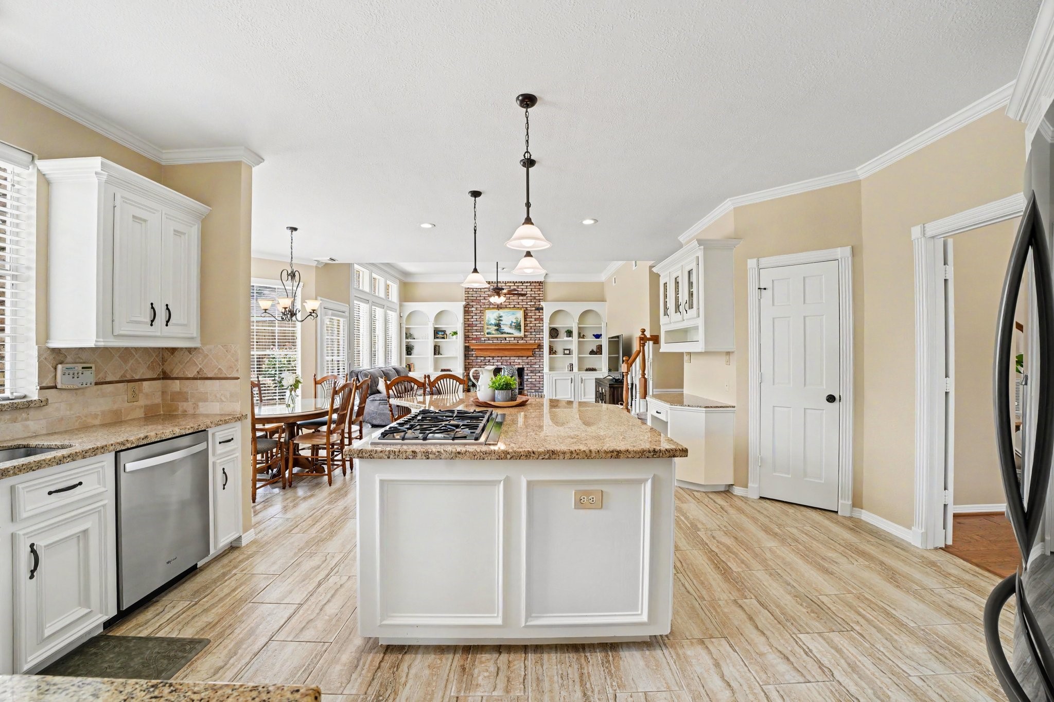3411 Fir Forest Drive Spring, TX 77388 - Photo 13 of 39 View of the kitchen looking out towards the breakfast area and family room.