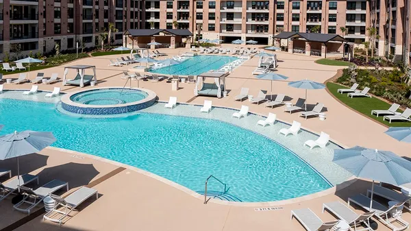 a view of a swimming pool and outdoor space