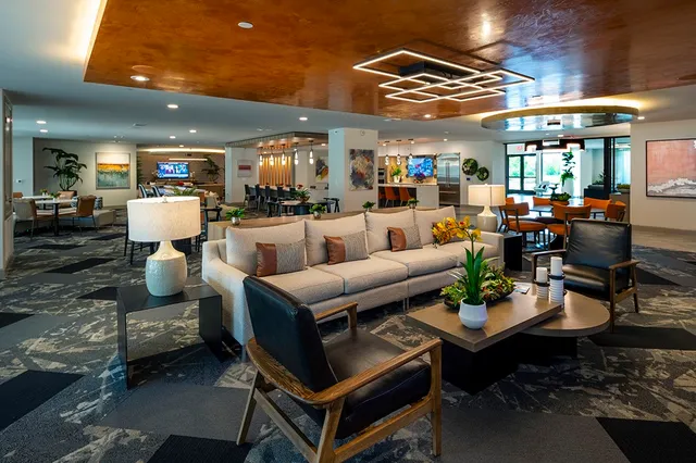 a outdoor living space with furniture and a fireplace