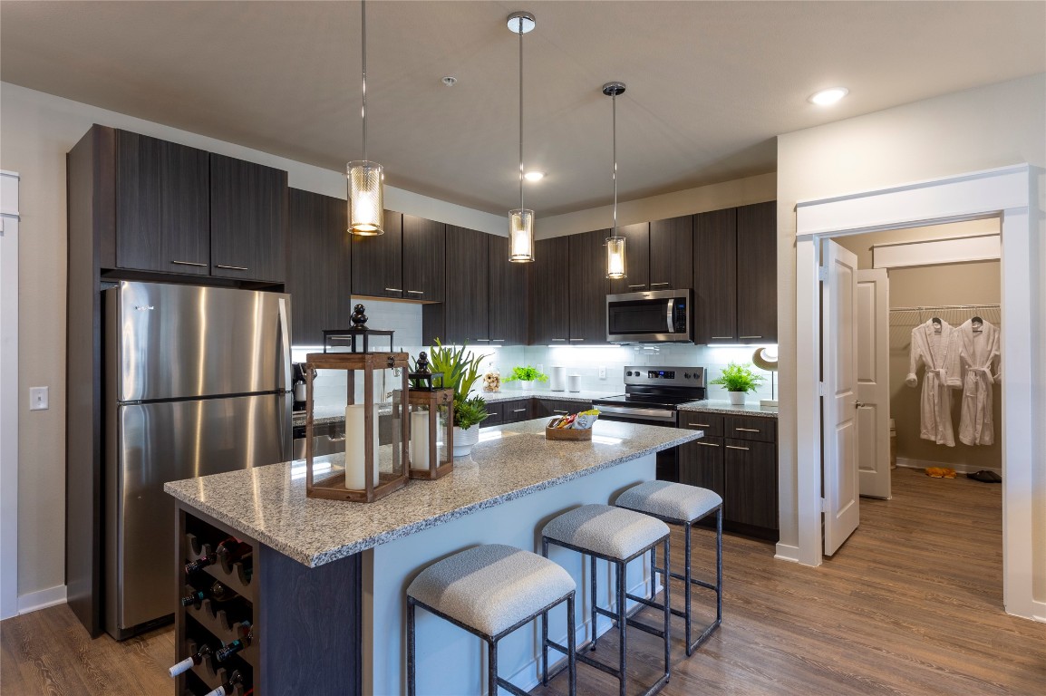 1724 Partnership Way, Unit 1439 Katy, TX 77449 - Photo 21 of 31 Kitchen -this is the furnished model, not actual unit, photo is for reference only