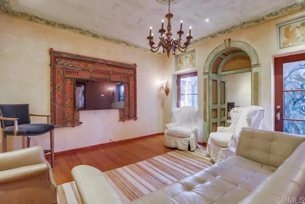 3014 Xenophon Street San Diego, CA 92106 - Photo 13 of 73 a living room with furniture and a chandelier
