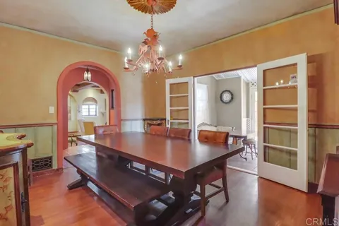 a kitchen with stainless steel appliances granite countertop a refrigerator and a stove
