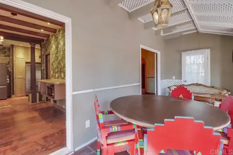 a spacious bathroom with a granite countertop double vanity sink a mirror and a shower
