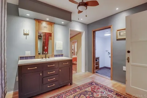 a kitchen with stainless steel appliances granite countertop a sink and dishwasher refrigerator a microwave