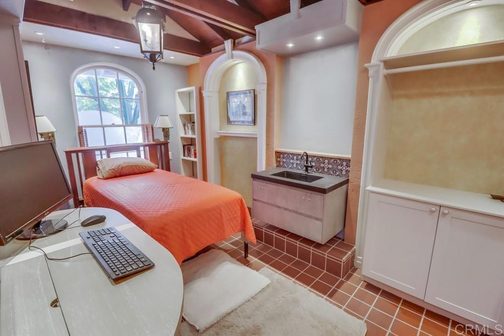 3014 Xenophon Street San Diego, CA 92106 - Photo 33 of 73 a bedroom with furniture and window