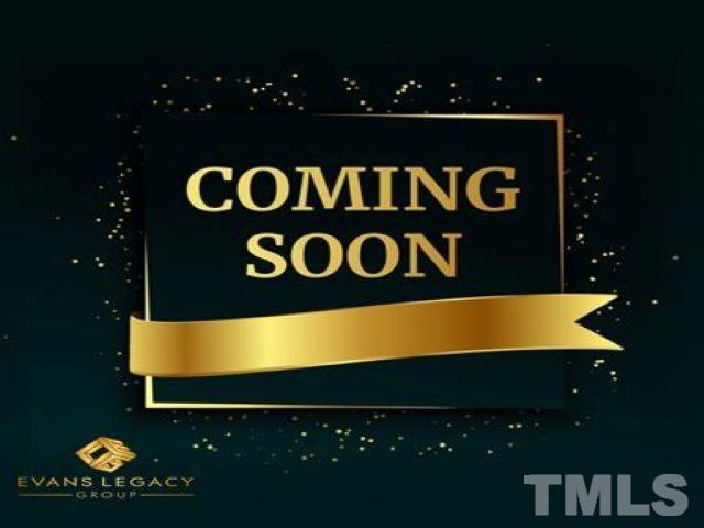 a blue sign that is sitting on a wall