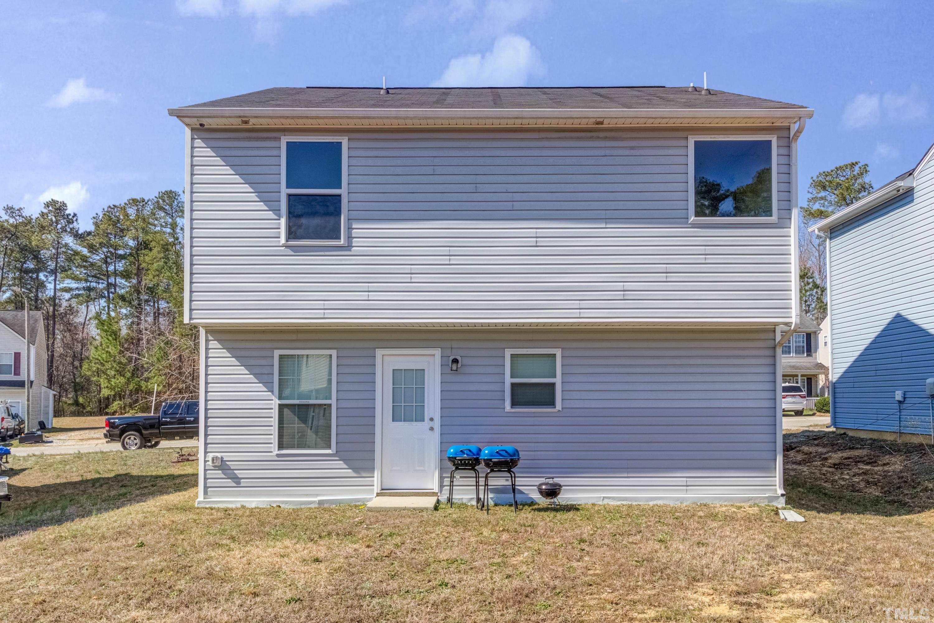 2925 Filbert Street Raleigh, NC 27610 - Photo 20 of 21 a front view of a house with a yard