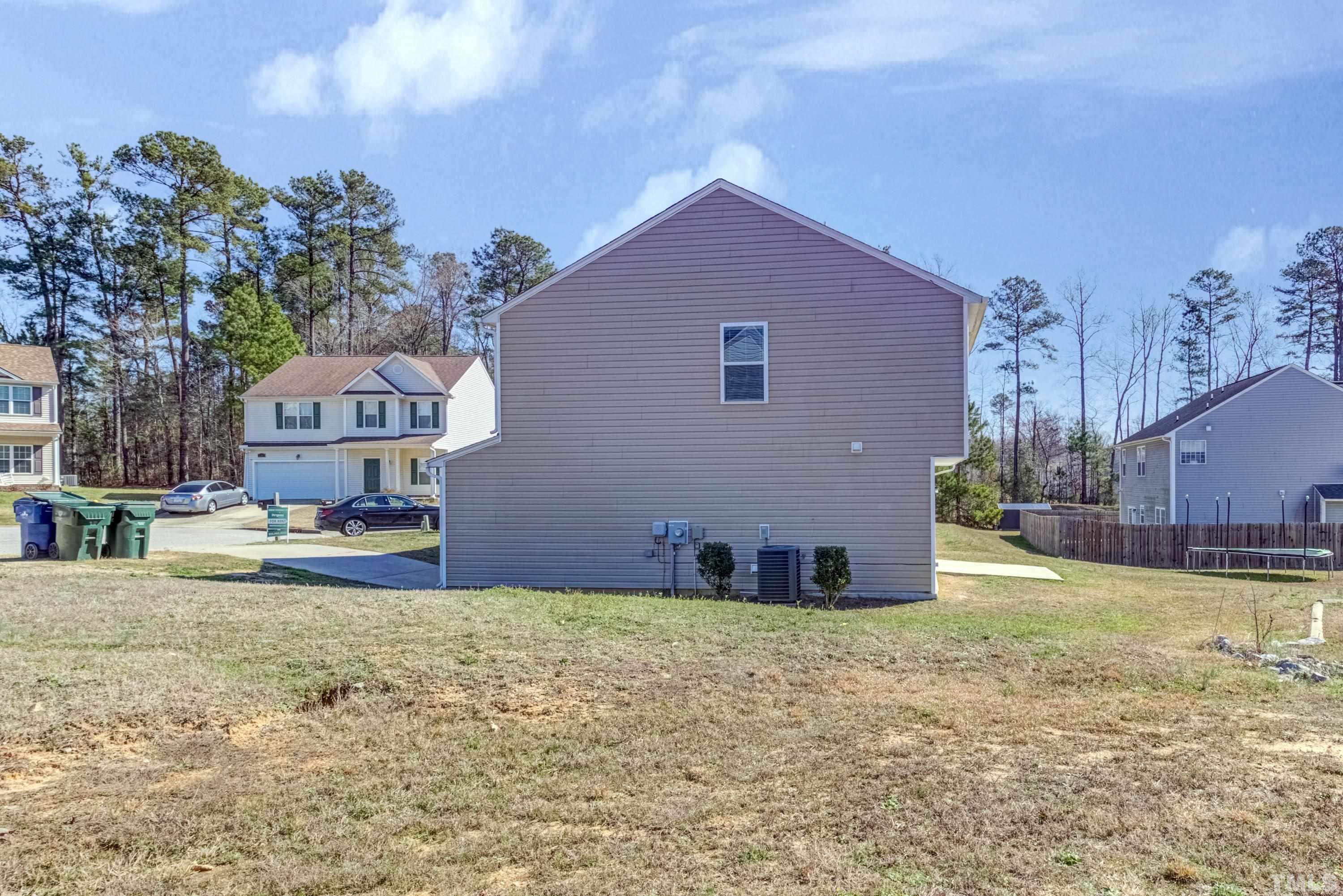2925 Filbert Street Raleigh, NC 27610 - Photo 21 of 21 a house view with a garden space