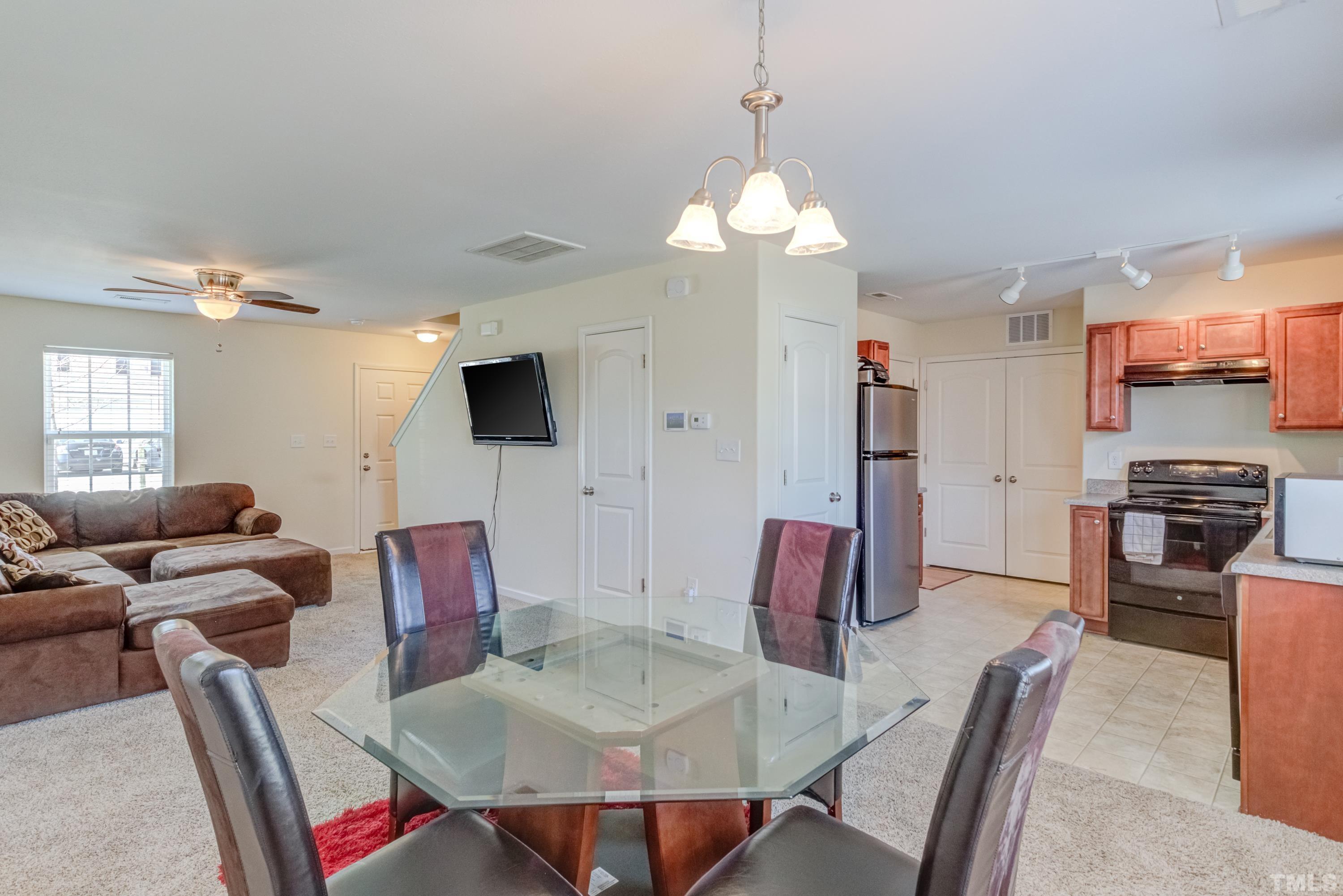 2925 Filbert Street Raleigh, NC 27610 - Photo 5 of 21 a view of a dining room with furniture