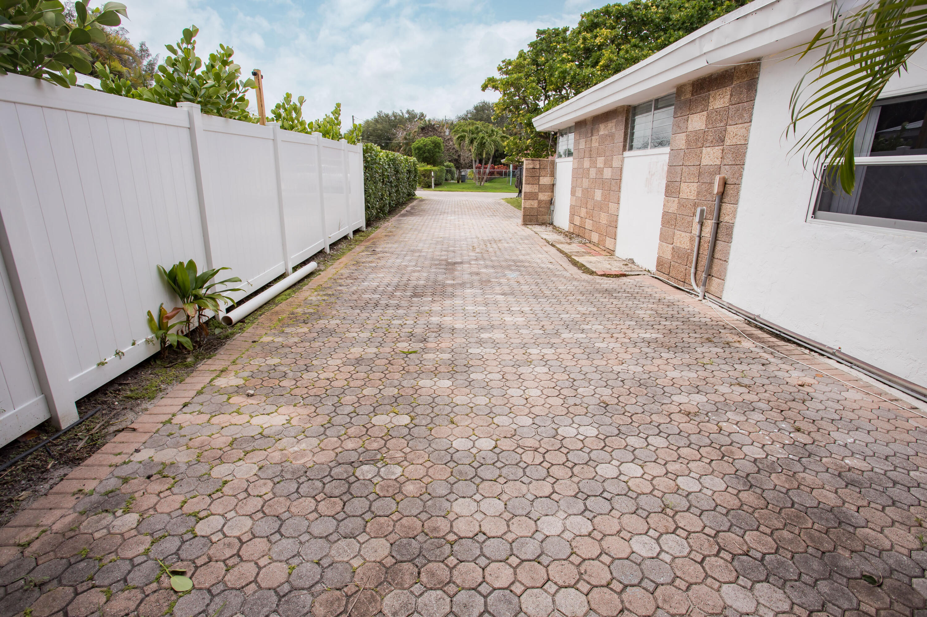 7306 Clarke Road Lake Clarke Shores, FL 33406 - Photo 26 of 77 Drive Way Rear 2