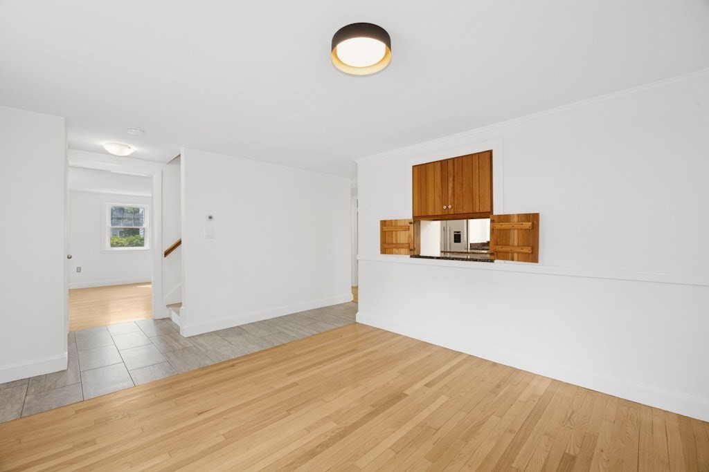 54 Mohawk Drive Acton, MA 01720 - Photo 17 of 42 a view of a room with wooden floor and a sink