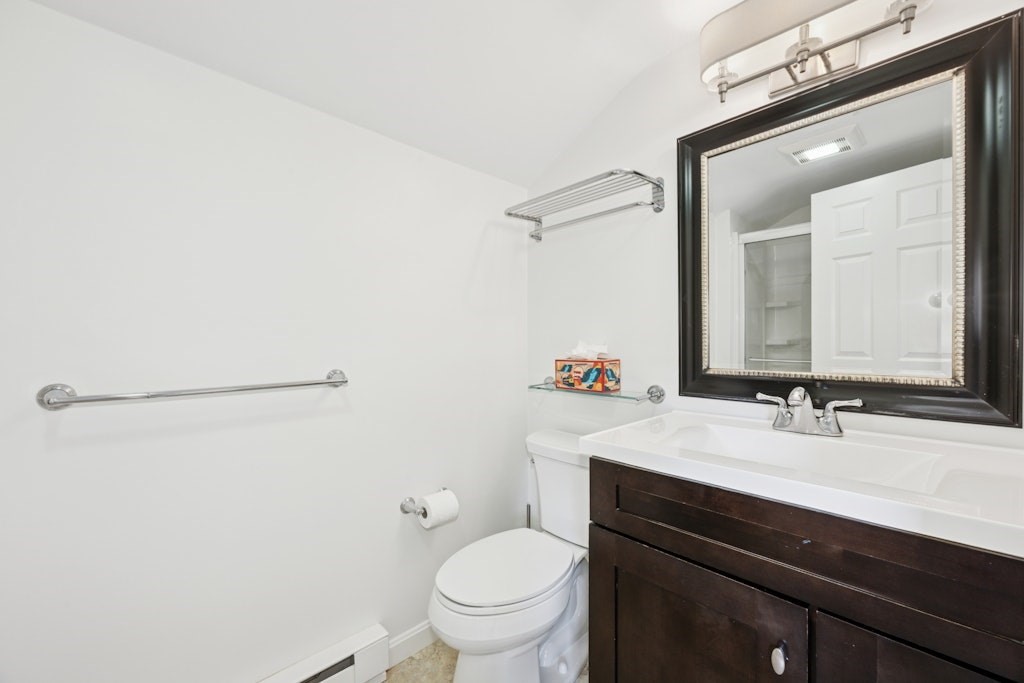 54 Mohawk Drive Acton, MA 01720 - Photo 23 of 42 a bathroom with a sink and a toilet