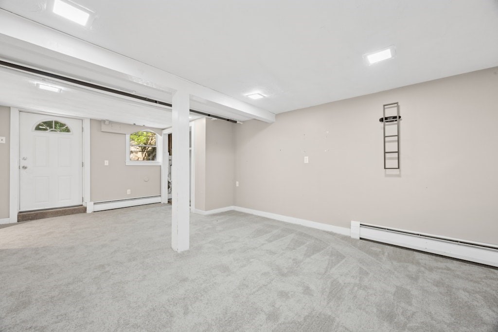 54 Mohawk Drive Acton, MA 01720 - Photo 32 of 42 an empty room with a empty space and windows