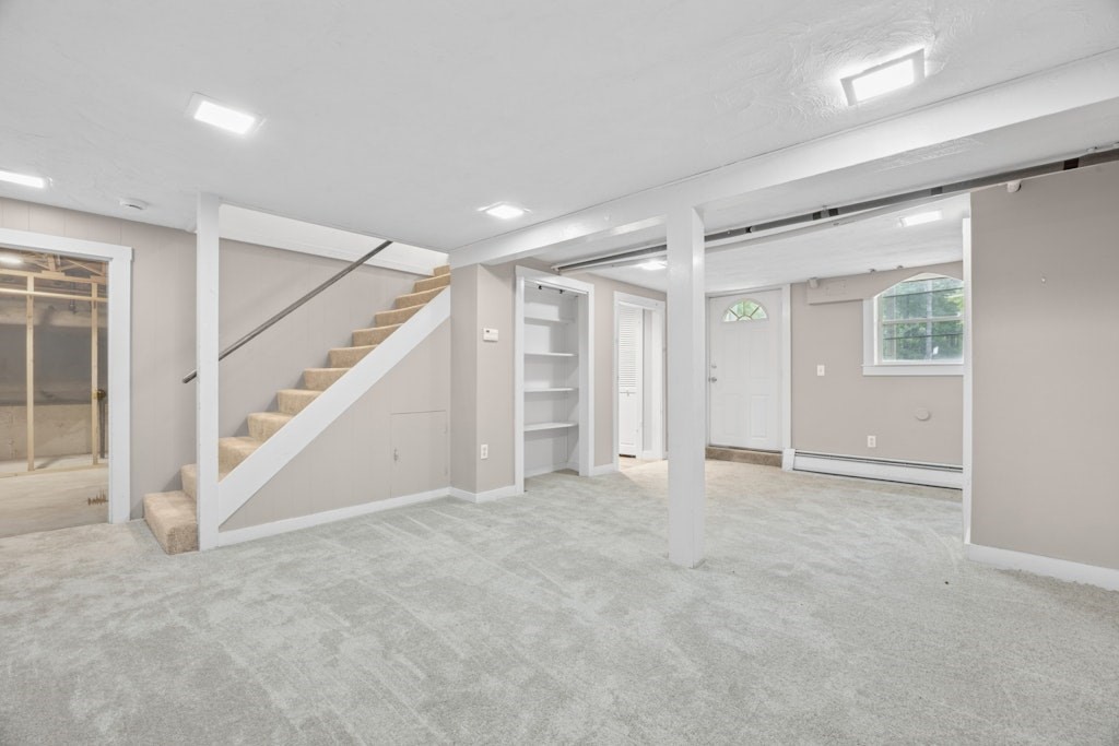 54 Mohawk Drive Acton, MA 01720 - Photo 33 of 42 a view of an empty room with stairs