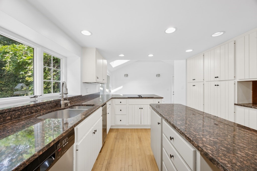 54 Mohawk Drive Acton, MA 01720 - Photo 6 of 42 a large kitchen with granite countertop a large counter top and sink