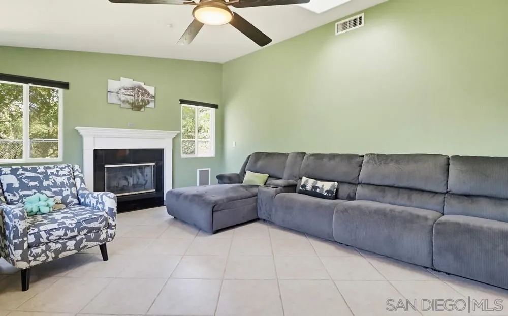 359 Galloway Valley Road Alpine, CA 91901 - Photo 18 of 50 a living room with furniture and a fireplace