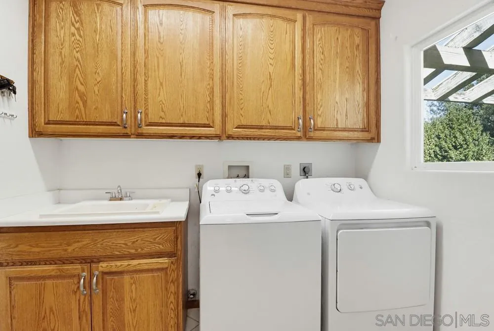 359 Galloway Valley Road Alpine, CA 91901 - Photo 27 of 50 a utility room with dryer and washer