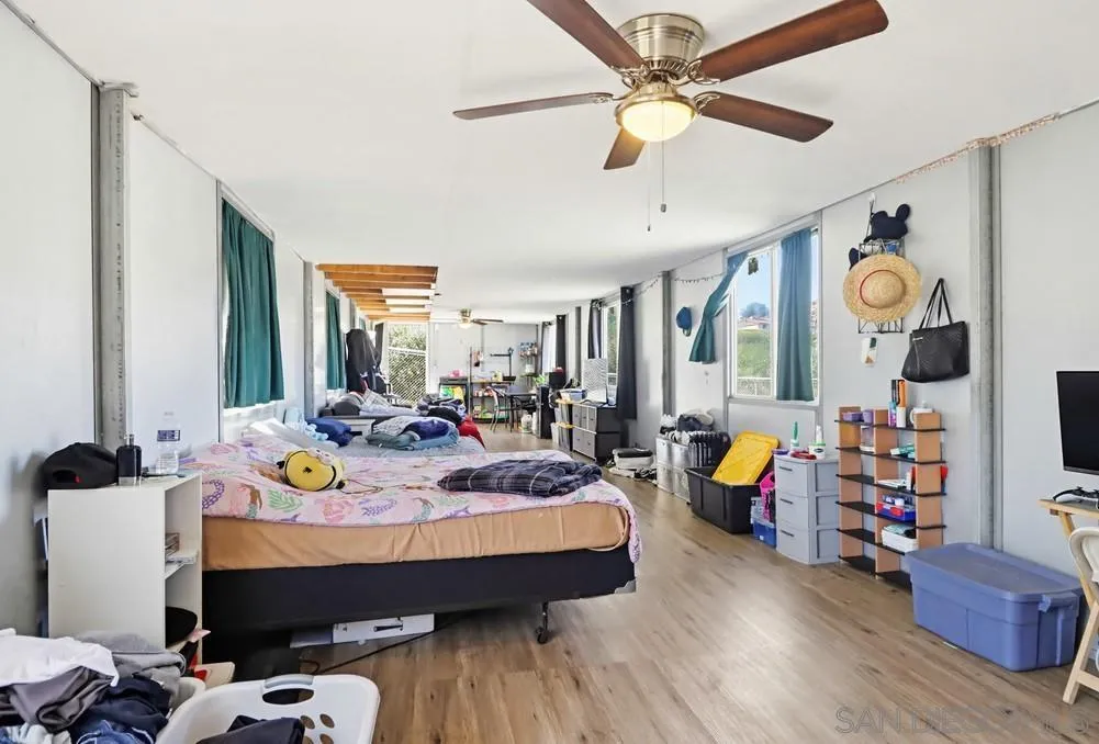 359 Galloway Valley Road Alpine, CA 91901 - Photo 38 of 50 a bed room with furniture and wooden floor