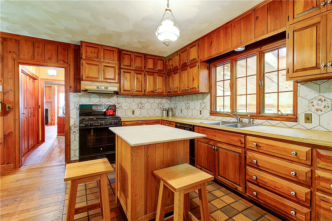 26 Burgess Road Foster, RI 02825 - Photo 7 of 42 The solid wood custom built kitchen cabinets were made by the homeowner who was a master woodworker