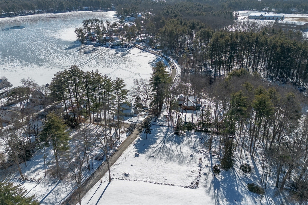 65 Barton Road Stow, MA 01775 - Photo 15 of 17 a view of a yard with wooden fence