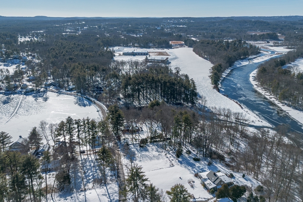 65 Barton Road Stow, MA 01775 - Photo 8 of 17 a view of a lake in middle of the town