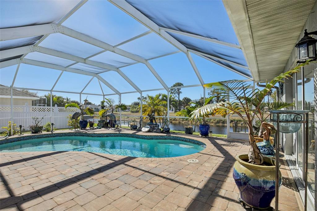 257 Medalist Road Rotonda West, FL 33947 - Photo 2 of 32 a view of outdoor space yard and patio