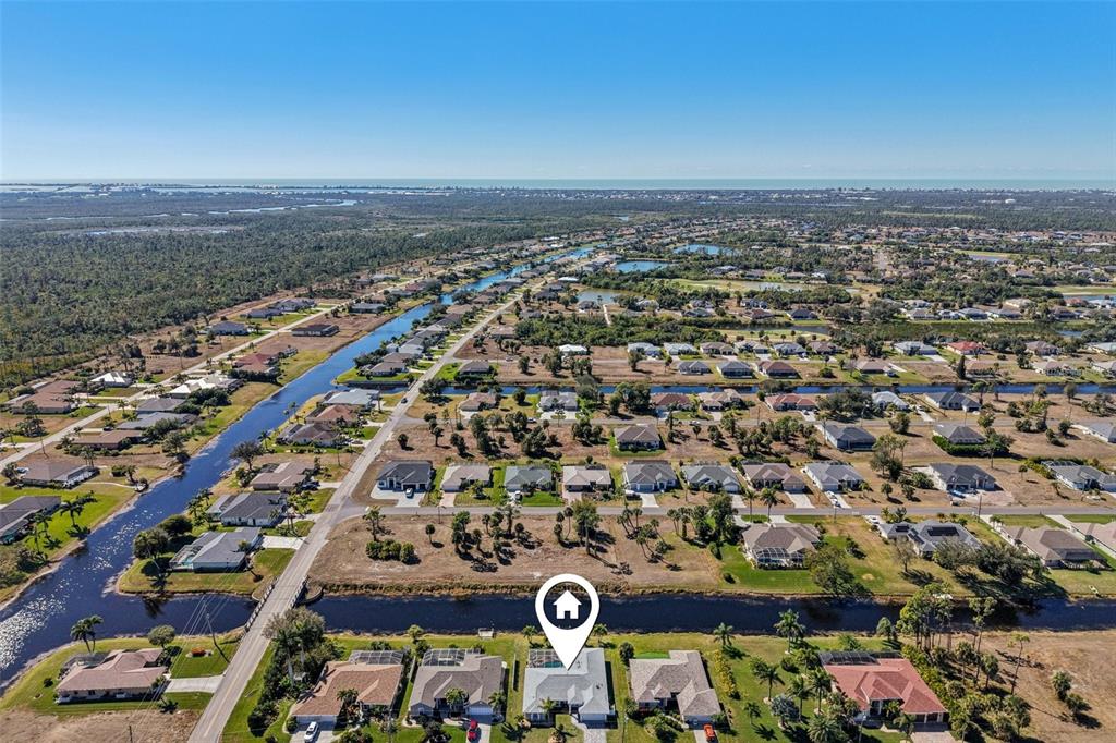 257 Medalist Road Rotonda West, FL 33947 - Photo 28 of 32 an aerial view of a city