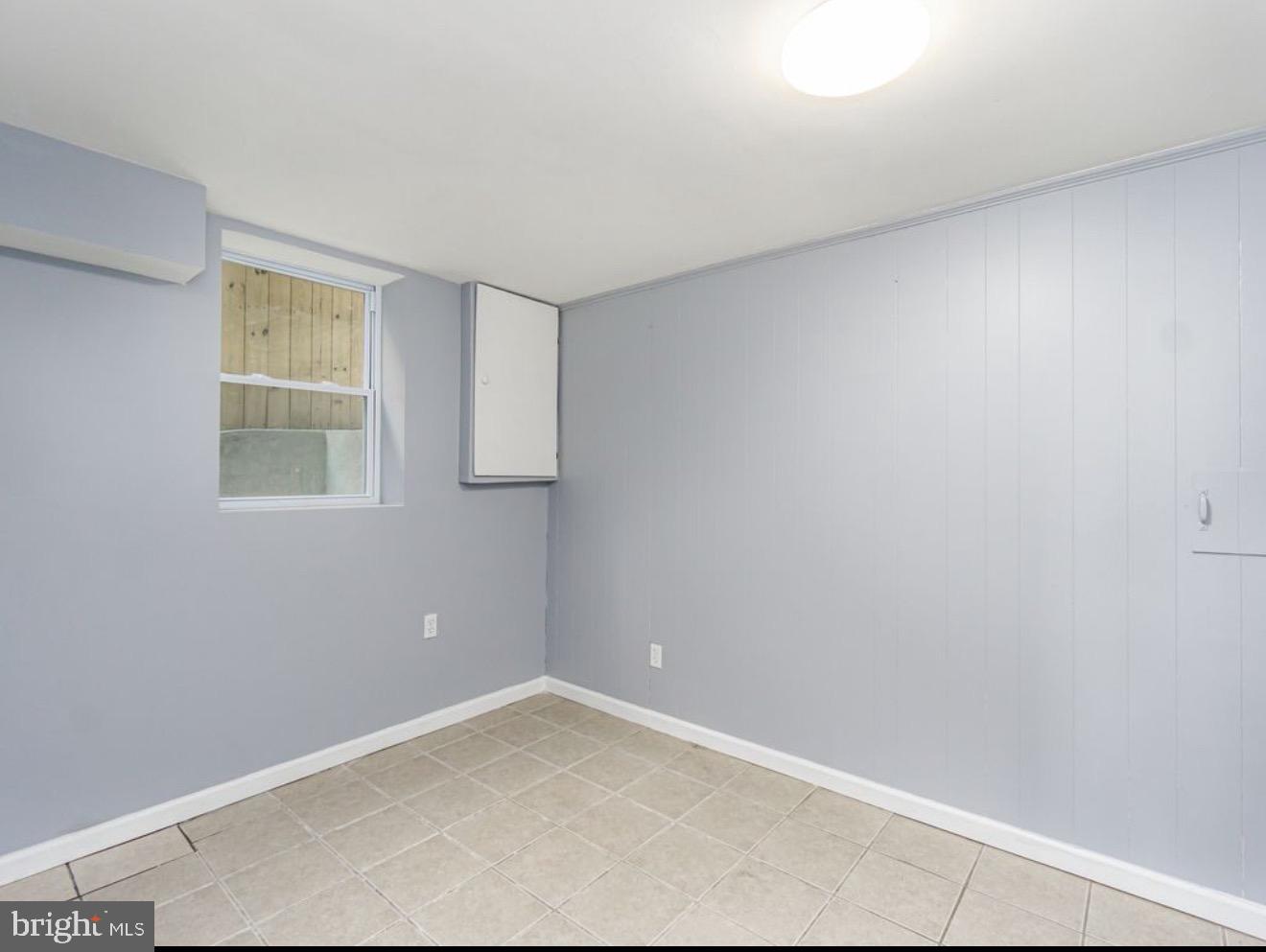 5730 Eastern Avenue Northeast Washington, DC 20011 - Photo 4 of 5 a view of an empty room with a window