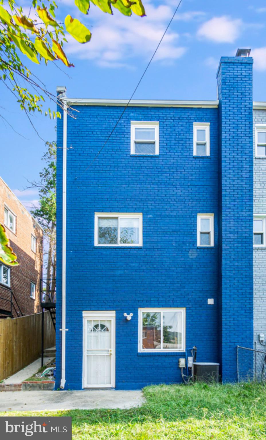 5730 Eastern Avenue Northeast Washington, DC 20011 - Photo 5 of 5 a view of a building with a yard