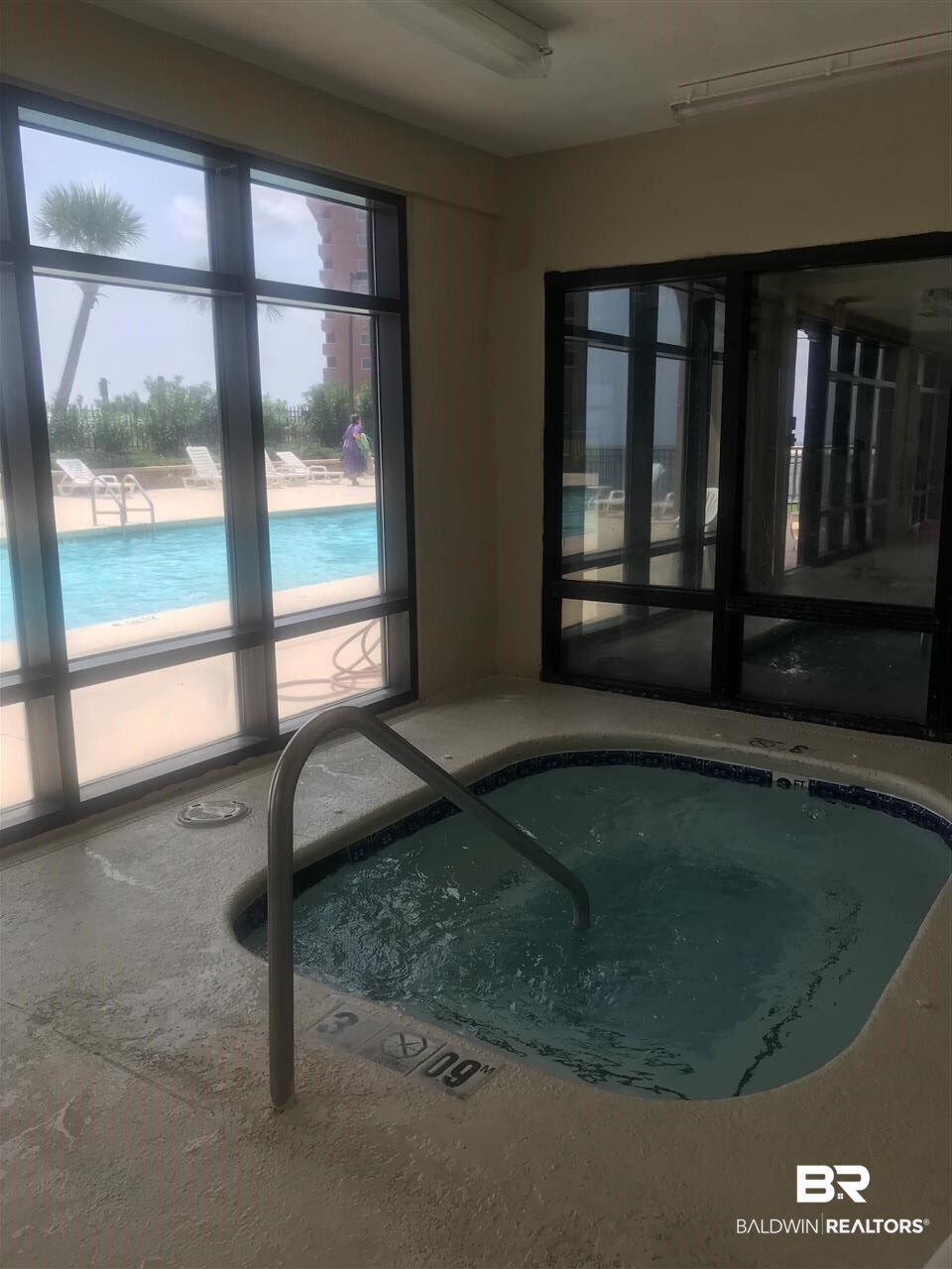 27284 Gulf Road, Unit 213 Orange Beach, AL 36561 - Photo 37 of 40 Indoor w/views of the outdoor pool and The Pass.