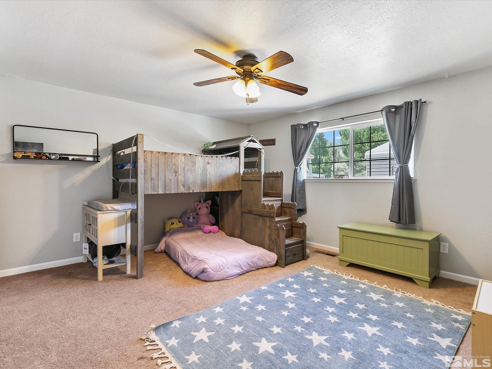 660 Northview Drive Fallon, NV 89406 - Photo 24 of 33 a bedroom with furniture and a window