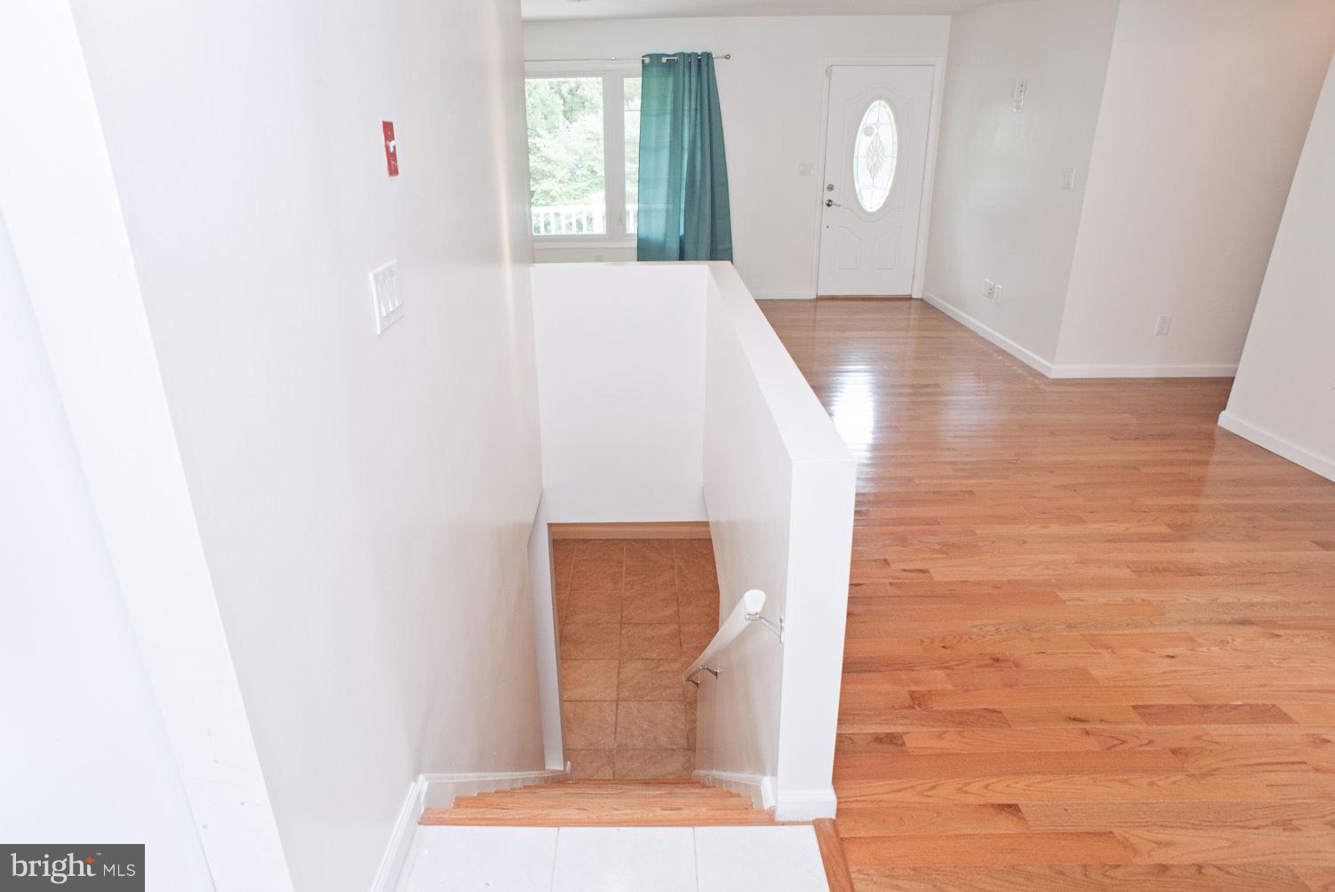 11601 Johns Hopkins Road Fulton, MD 20759 - Photo 22 of 30 Staircase to Lower Level