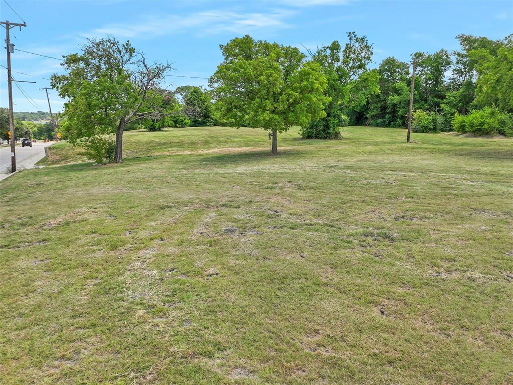 2202 Rowlett Road Garland, TX 75043 - Photo 9 of 16 a view of outdoor space with trees all around