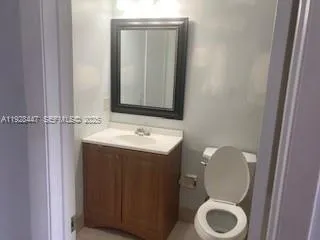 a bathroom with a sink and a toilet