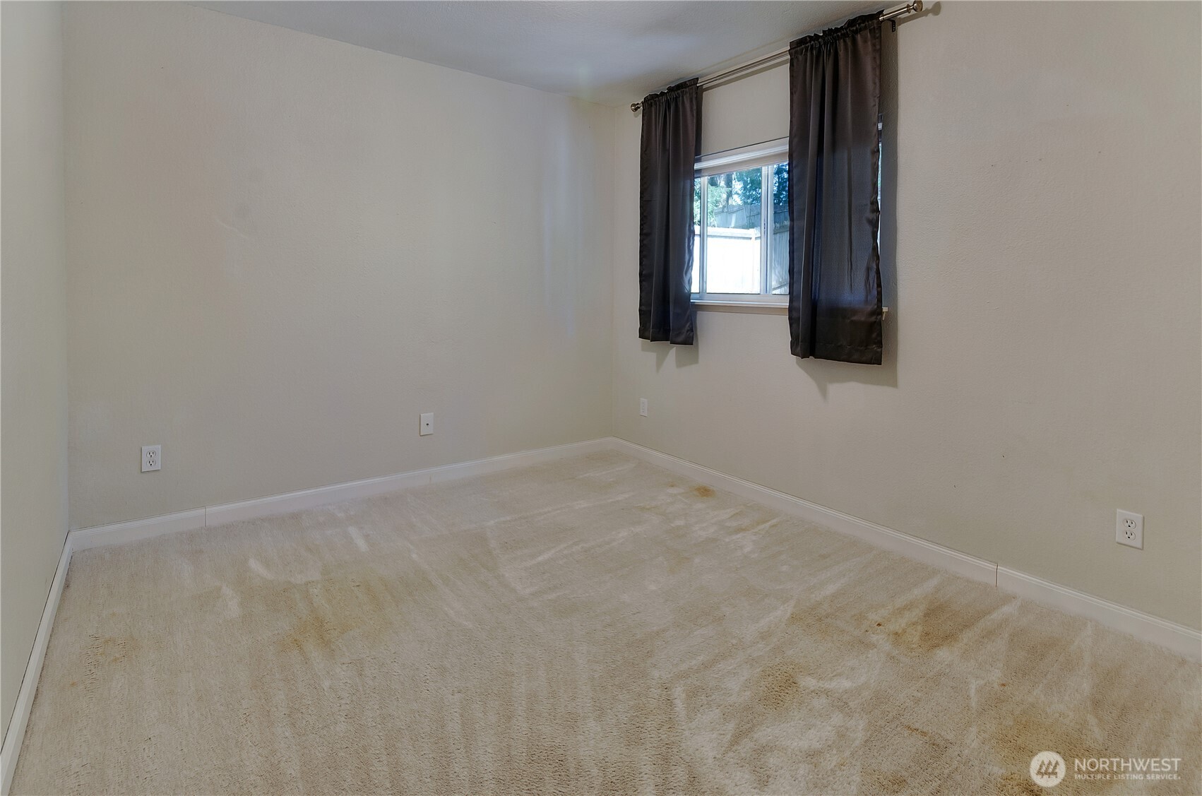 5214 78th Court Southwest Olympia, WA 98512 - Photo 15 of 27 an empty room with windows