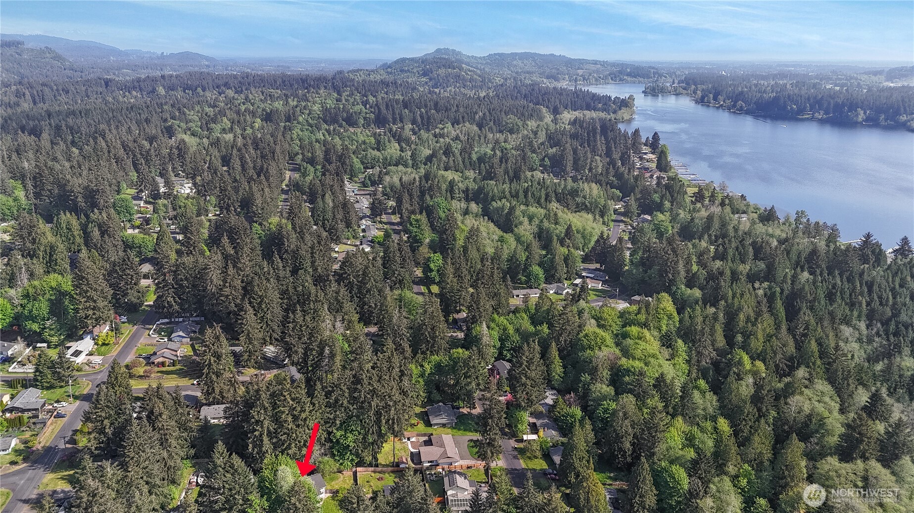 5214 78th Court Southwest Olympia, WA 98512 - Photo 25 of 27 a view of a city with lush green forest