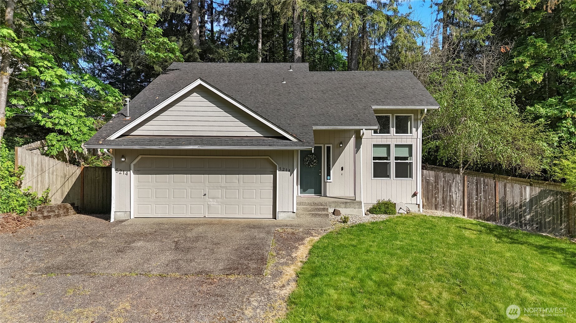 5214 78th Court Southwest Olympia, WA 98512 - Photo 27 of 27 a house that has tree in front of it