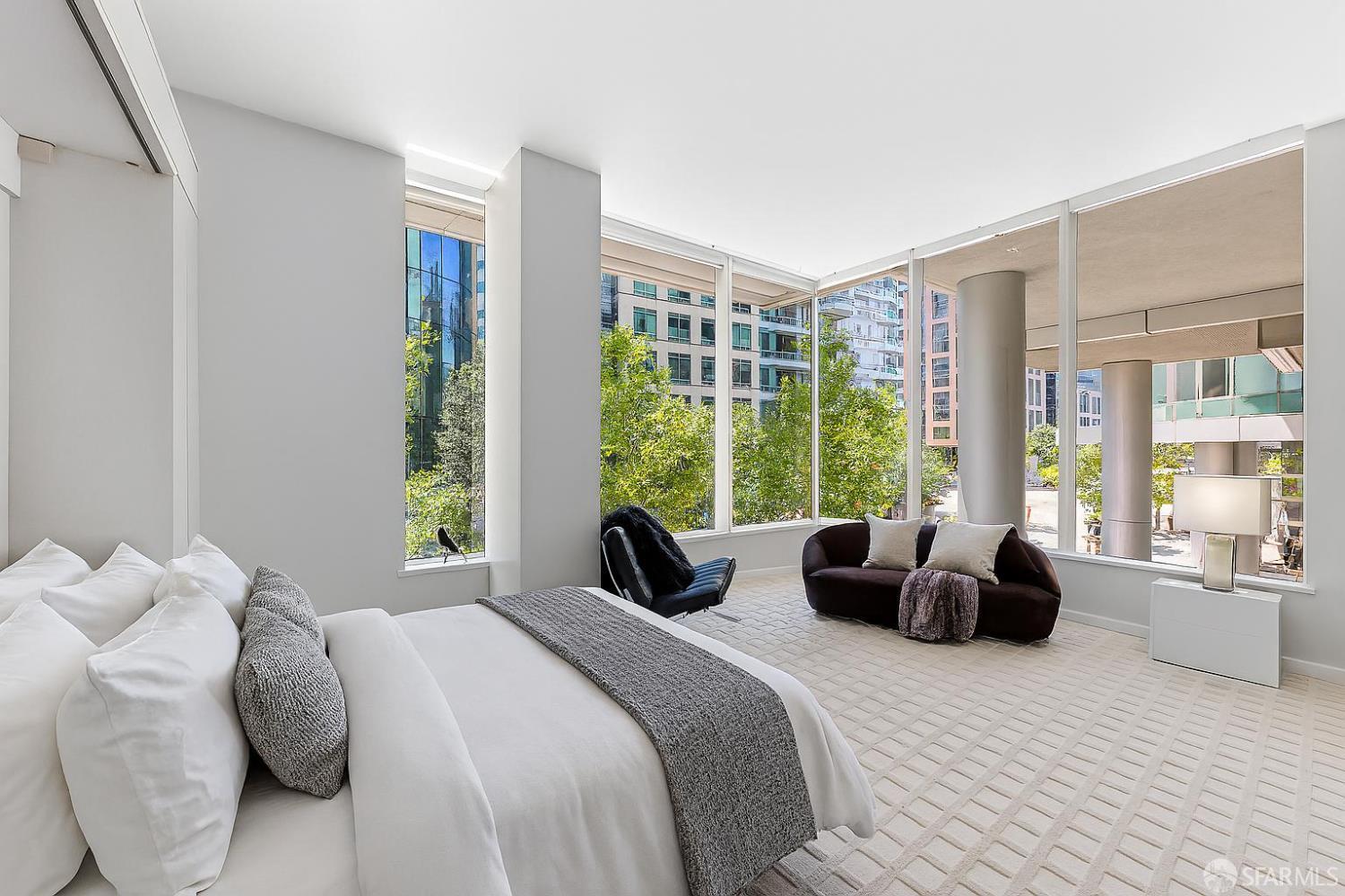 333 Main Street, Unit 2A San Francisco, CA 94105 - Photo 1 of 24 a bedroom with furniture and a large window