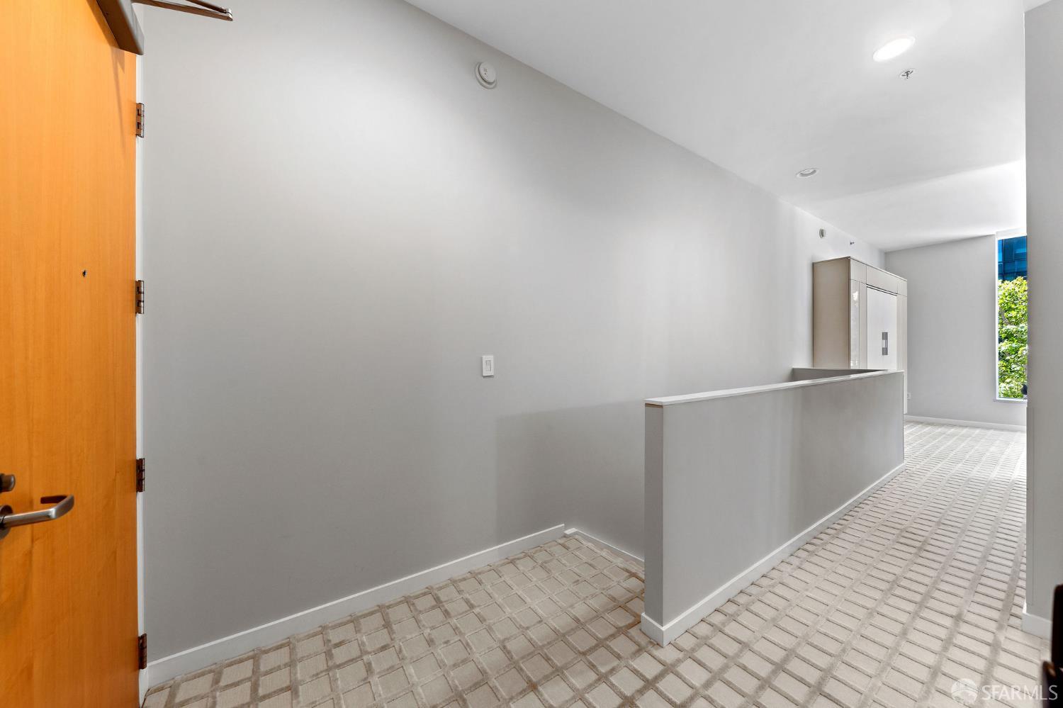 333 Main Street, Unit 2A San Francisco, CA 94105 - Photo 15 of 24 a view of hallway with wooden floor