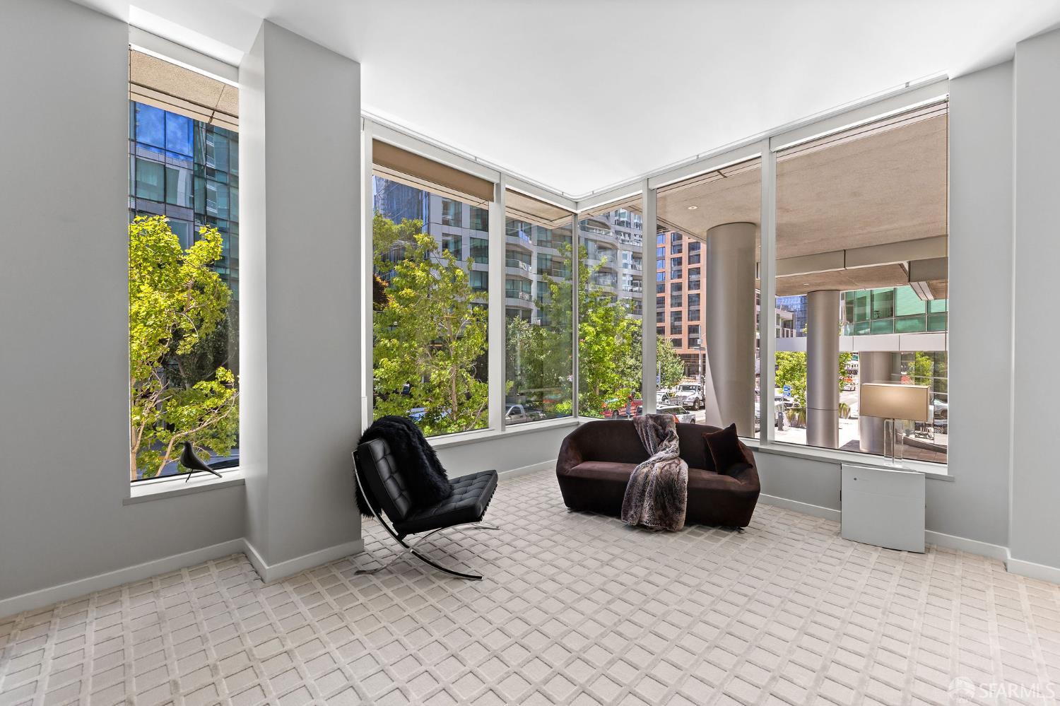 333 Main Street, Unit 2A San Francisco, CA 94105 - Photo 18 of 24 a living room with furniture and a large window