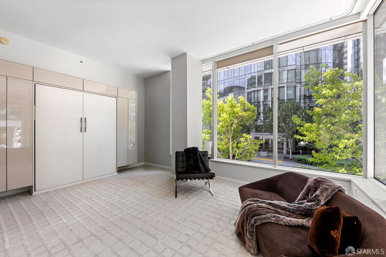 333 Main Street, Unit 2A San Francisco, CA 94105 - Photo 19 of 24 a living room with furniture and a window