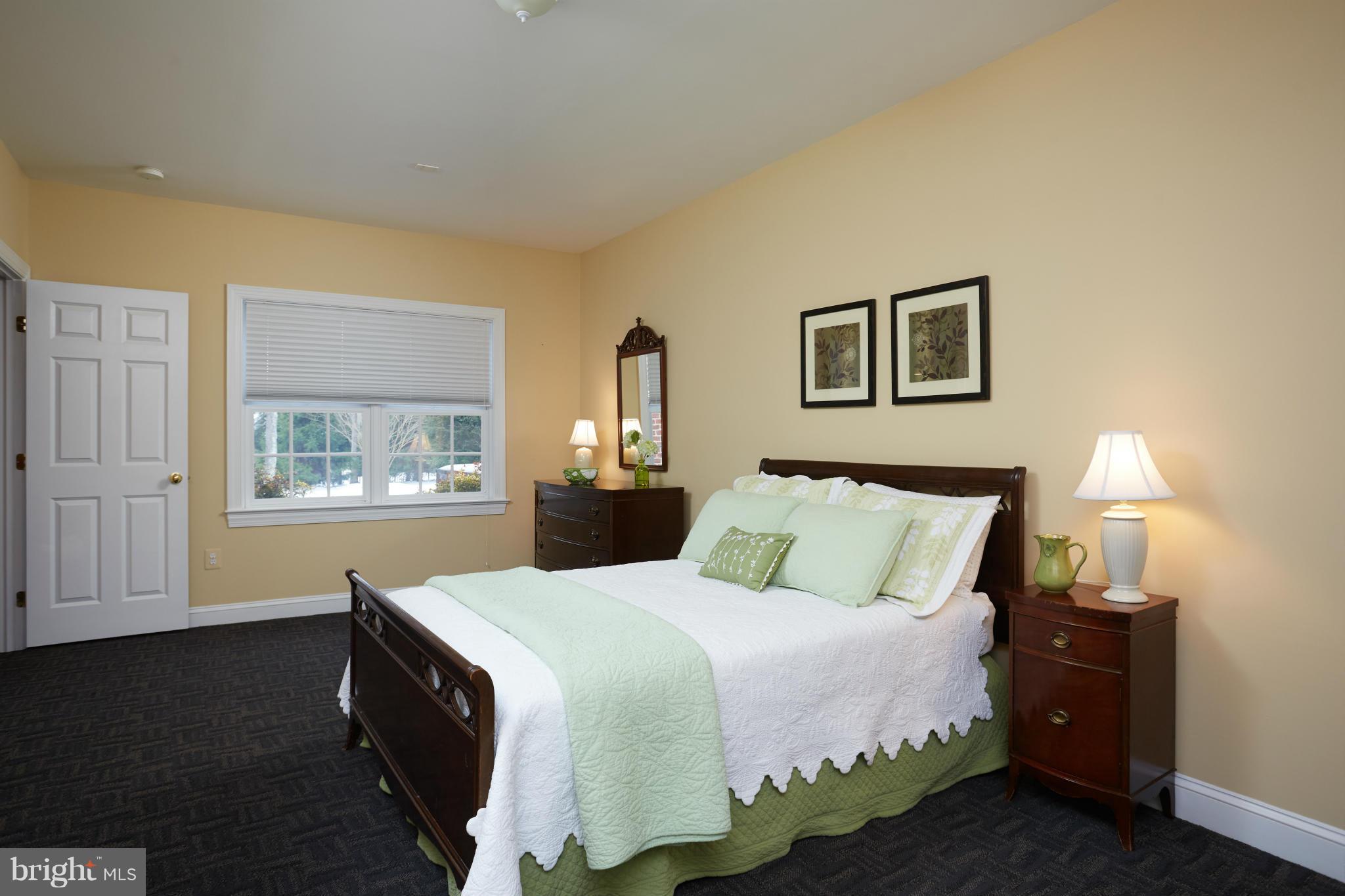 12636 Greenbriar Road Potomac, MD 20854 - Photo 25 of 30 a bedroom with a bed and a window