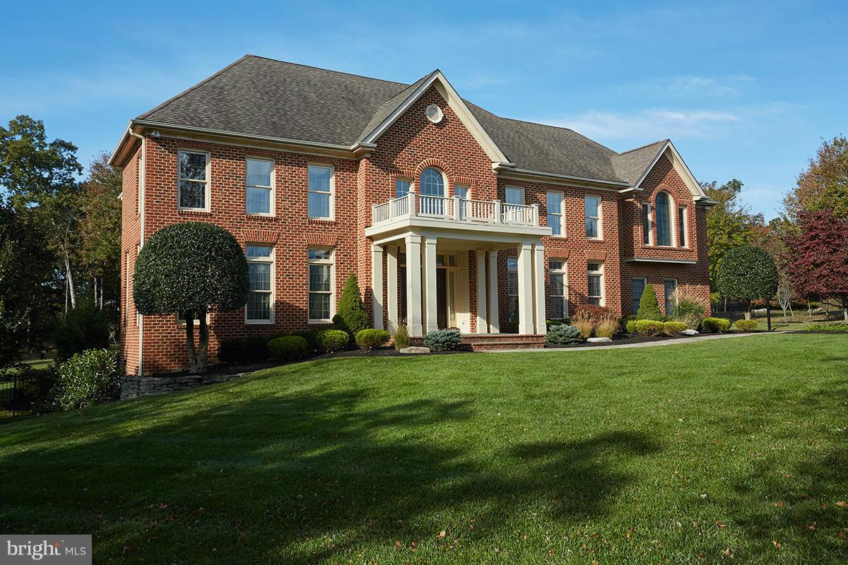 12636 Greenbriar Road Potomac, MD 20854 - Photo 30 of 30 a front view of a house with a yard