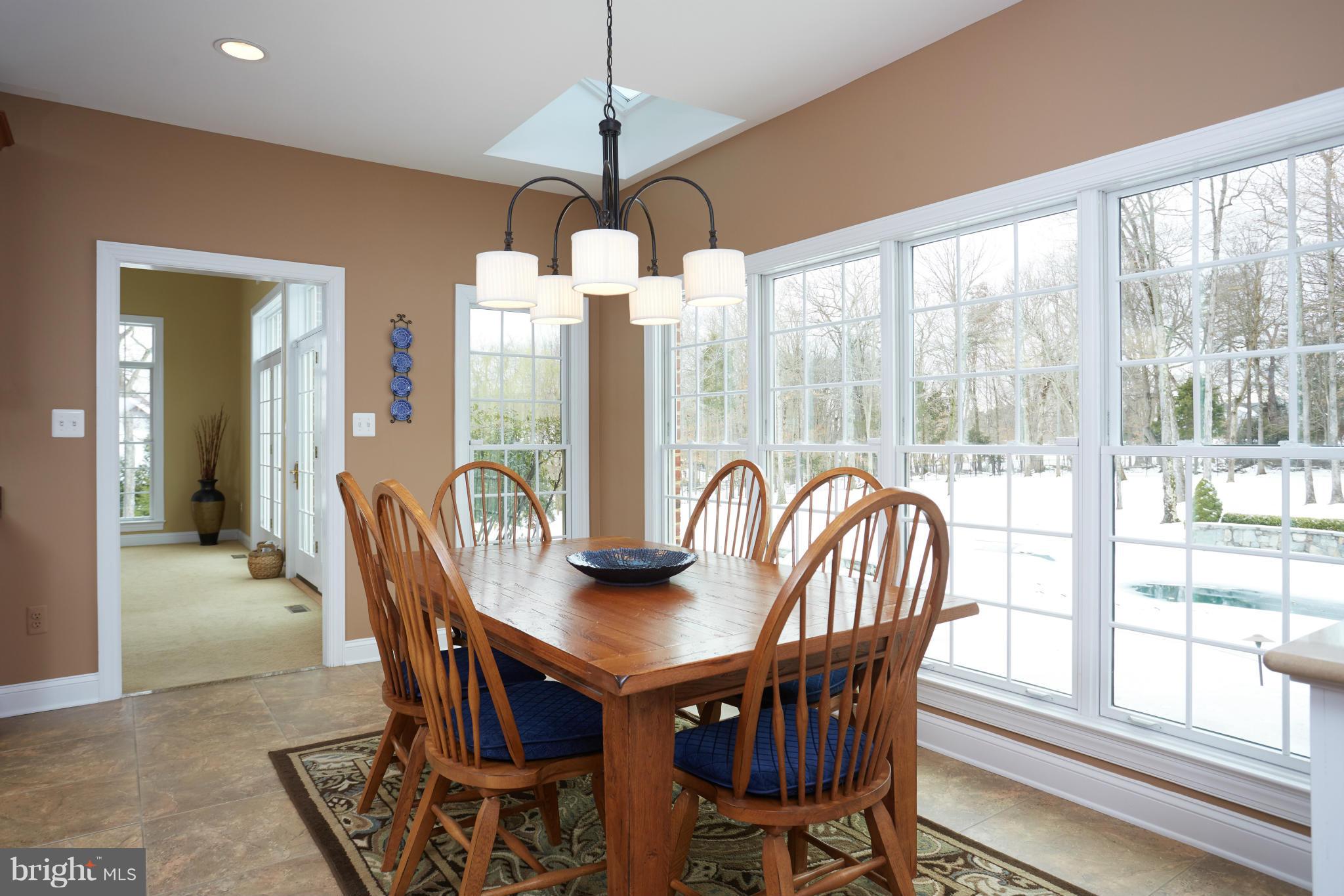 12636 Greenbriar Road Potomac, MD 20854 - Photo 10 of 30 a view of a dining room with furniture window and outside view