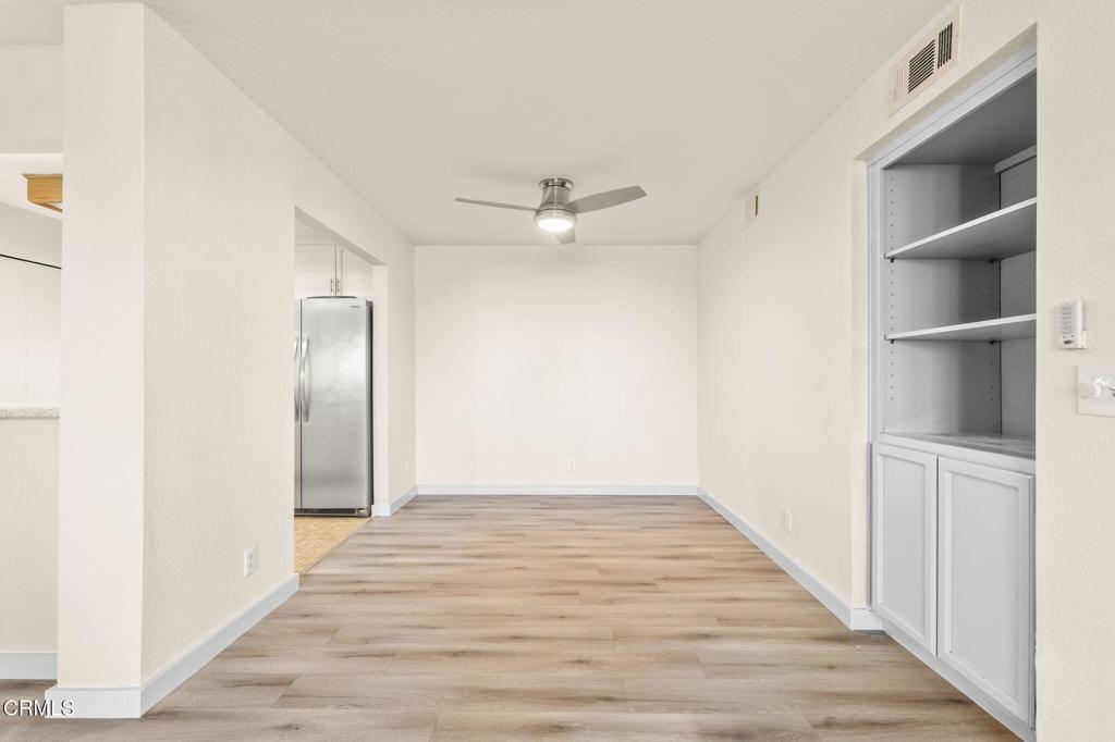 2202 Martinique Lane Oxnard, CA 93035 - Photo 13 of 39 a view of an empty room with a ceiling fan