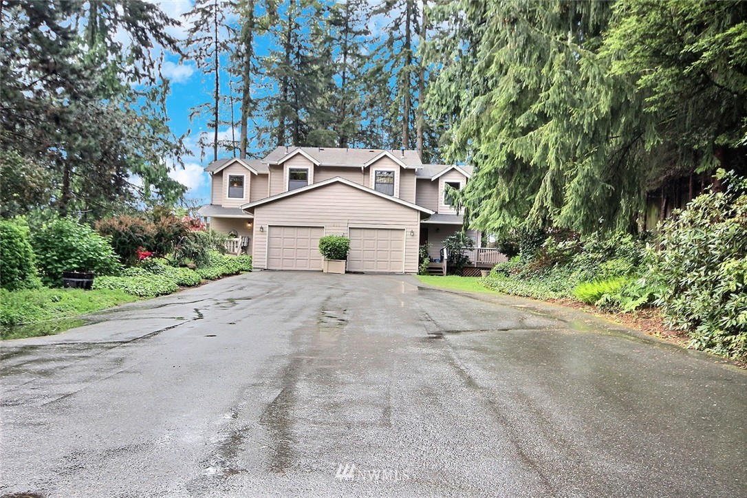 206 170th Place Southwest Bothell, WA 98012 - Photo 24 of 24 front view of a house with a street