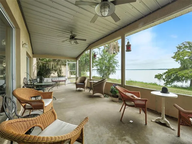 a outdoor space with patio furniture and a potted plant