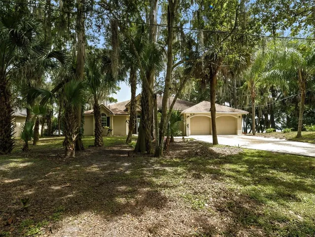 a house with trees in front of it