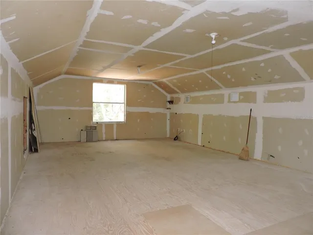 a view of a room with windows